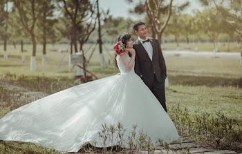 Standing Groom and Bride