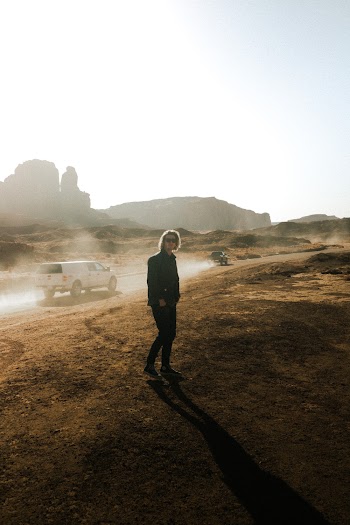 Standing Man Beside Road