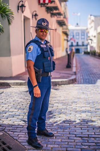Standing Man In Uniform Wearing Bulletproof Vest