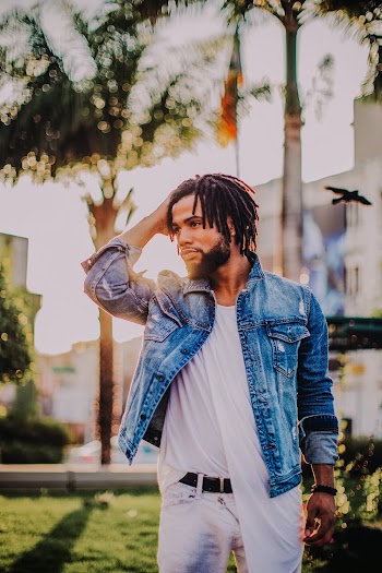 Standing Man Wearing Blue Denim Jacket