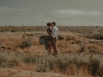 Standing Woman and Man Kissing