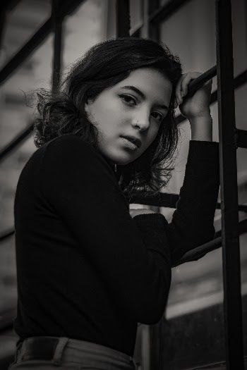 Standing Woman Wearing Long-sleeved Shirt