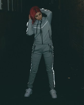 Standing Woman Wearing Track Suit