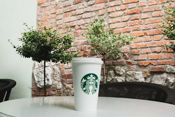 Starbucks Disposable Cup on Tabletop