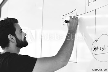 Startup Business People Writing on White Board Sharing Planning Strategy