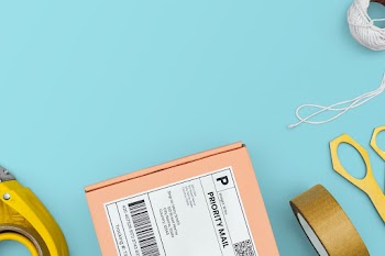 Stationery frame in parcel delivery concept | Free stock photo | High Resolution image