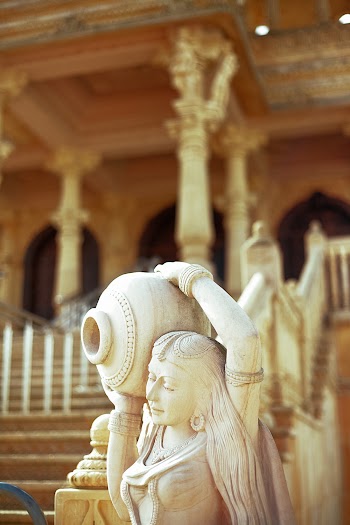 Statue of Woman Carrying Jar