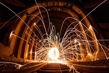 steel wool photography between concrete wall