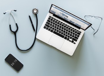 Stethoscope, Pen, Iphone, Macbook, and Sunglasses