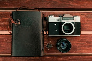 Still-life Photography Black and Silver Dslr Camera and Black Zoom Lens