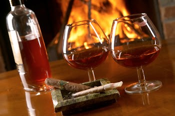 still life with cognac and cigars