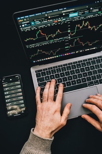 Stock Market Analysis with Laptop and Smartphone