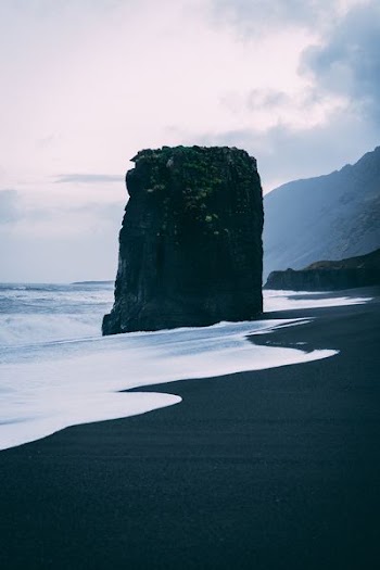 stone formation near shore