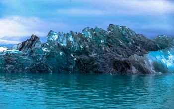 Stone Surrounded With Body of Water