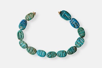 Strand of Inscribed Scarabs | Free Photo - rawpixel