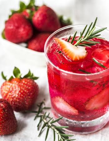Strawberries Near Clear Rocks Glass