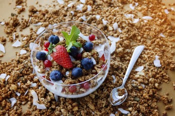 Strawberry And Blueberry On Clear Glass Bowl