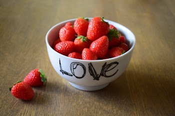 Strawberry on White Ceramic Bowl