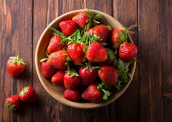 strawberry wooden plate spoon Vintage background