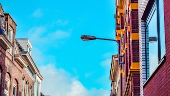 Street Lamp On Building Wall