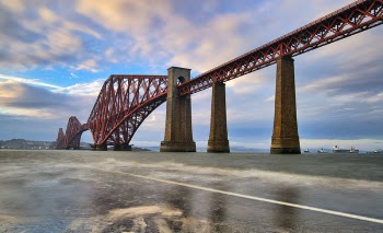 Structural Photography Of Red Suspension Bridge