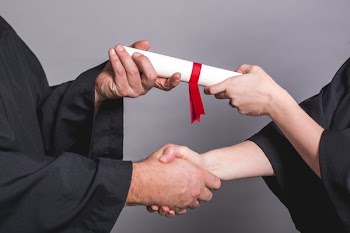 Student Getting Diploma