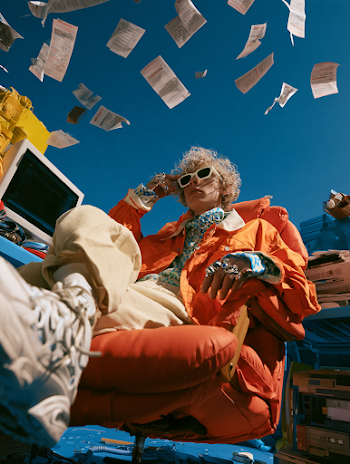 Stylish Gen Z Talent Exuding Confidence in a Surreal Workspace