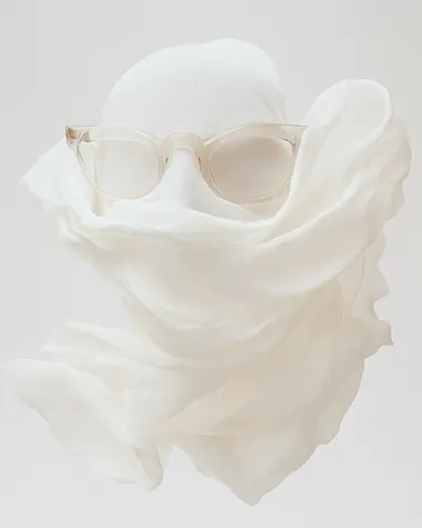 Stylish Model in White Hat and Organic Cloth Glasses with Scarf Stylish Model in White Hat and Organic Cloth Glasses with Scarf