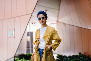 Stylish Woman Posing in Yellow Coat