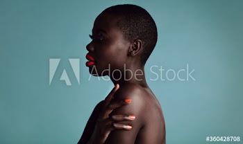 Stylish woman with metalic red lipstick and nailpaint