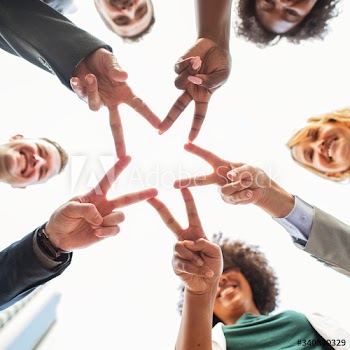 Successful business people making a star