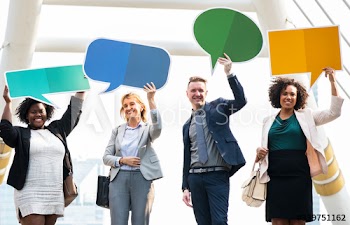 Successful business people with speech bubbles