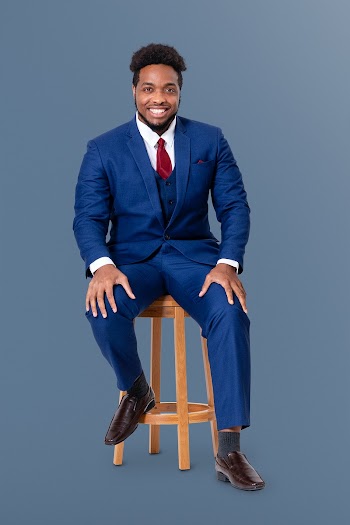 Successful businessman sitting on a wooden… | Free stock photo | High Resolution image