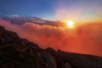 Sun Peaking Over Clouds