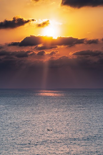 Sun Peeping Through Dark Clouds 