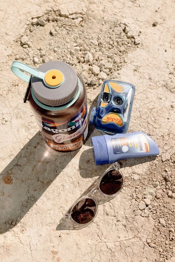 Sunglasses, Camera, Bottle, and Sport Bottle