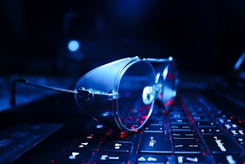 Sunglasses on Laptop Keyboard