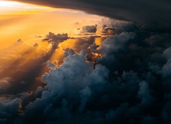 sunlight through clouds photography