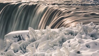 Sunlit Waterfalls And Ice Covered Branches