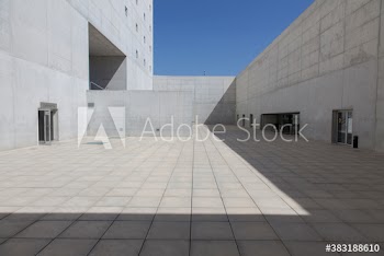 Sunny concrete building courtyard