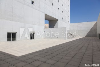 Sunny concrete building courtyard