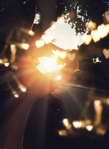 sunrays  person hand