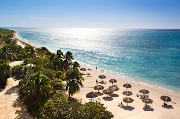 Sunrise beautiful tropical  beach at the Caribbean island with white sands and  stunning turquoise waters