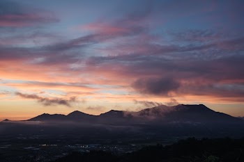 Sunrise Over The Horizon With Misty Sky