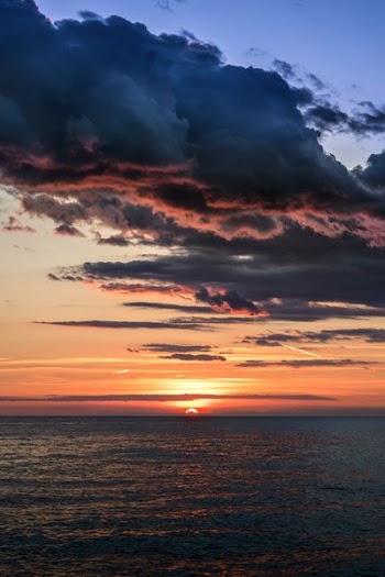 sunset by the sea during golden hour