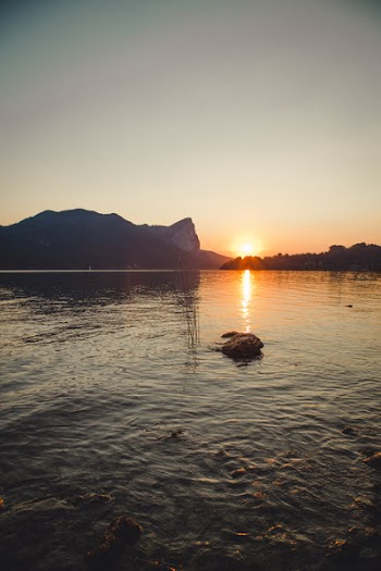 Sunset over Body of Water