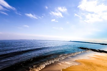 sunset waves sand sun summer beach.jpg