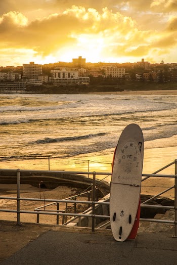 Surfboard Leaning On Railing