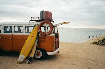 Surfboards Leaning on Van