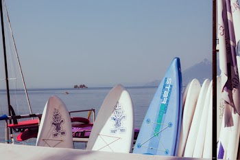 Surfboards Leaning on White Handrails